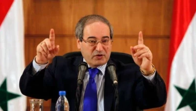 المقداد: قرار بايدن يسبب اثاراً كـ.ـارثية