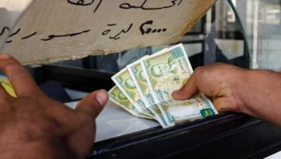 بالتزامن مع انهـ.ـيار سعر الصرف... عودة تجـ.ـريم التعامل بغير الليرة السورية