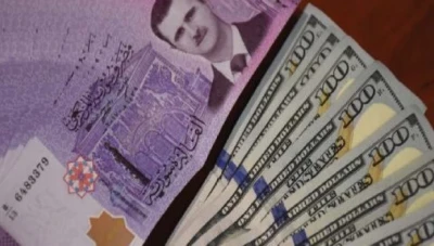 الليرة تواصل تحسنها أمام الدولار