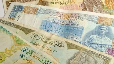 سعر صرف الليرة السورية عند افتتاح يوم الأربعاء
