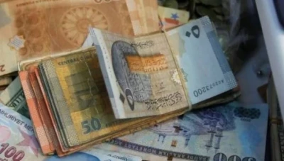 سعر صرف الليرة السورية في دمشق وحلب أمام بعض العملات 25/7/2019