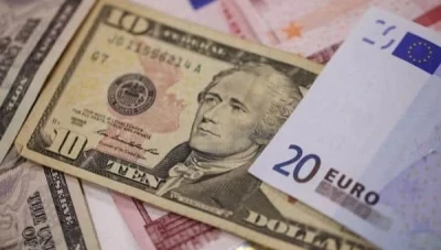 ضبط مكتب تجاري يتعامل بالقطع الأجنبي